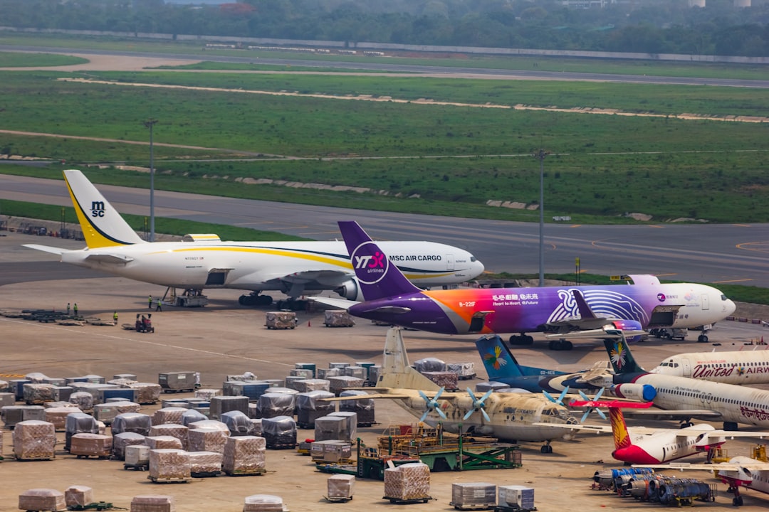 Two aircrafts unloading cargo in Dhaka.