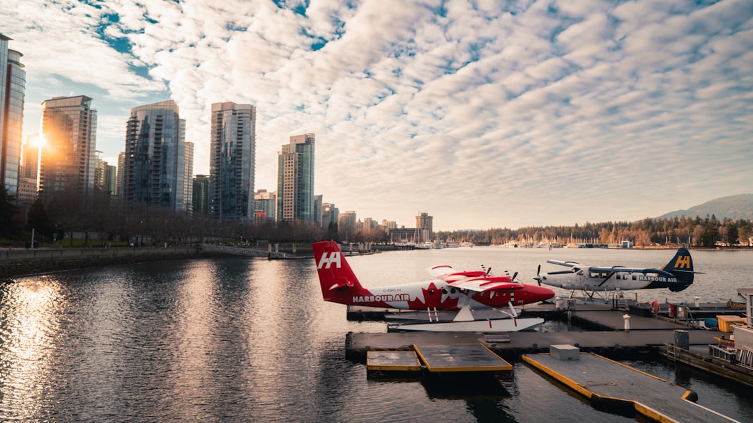 a-group-of-small-airplanes-parked-on-top-of-a-body-of-water-grkyhhwqocs